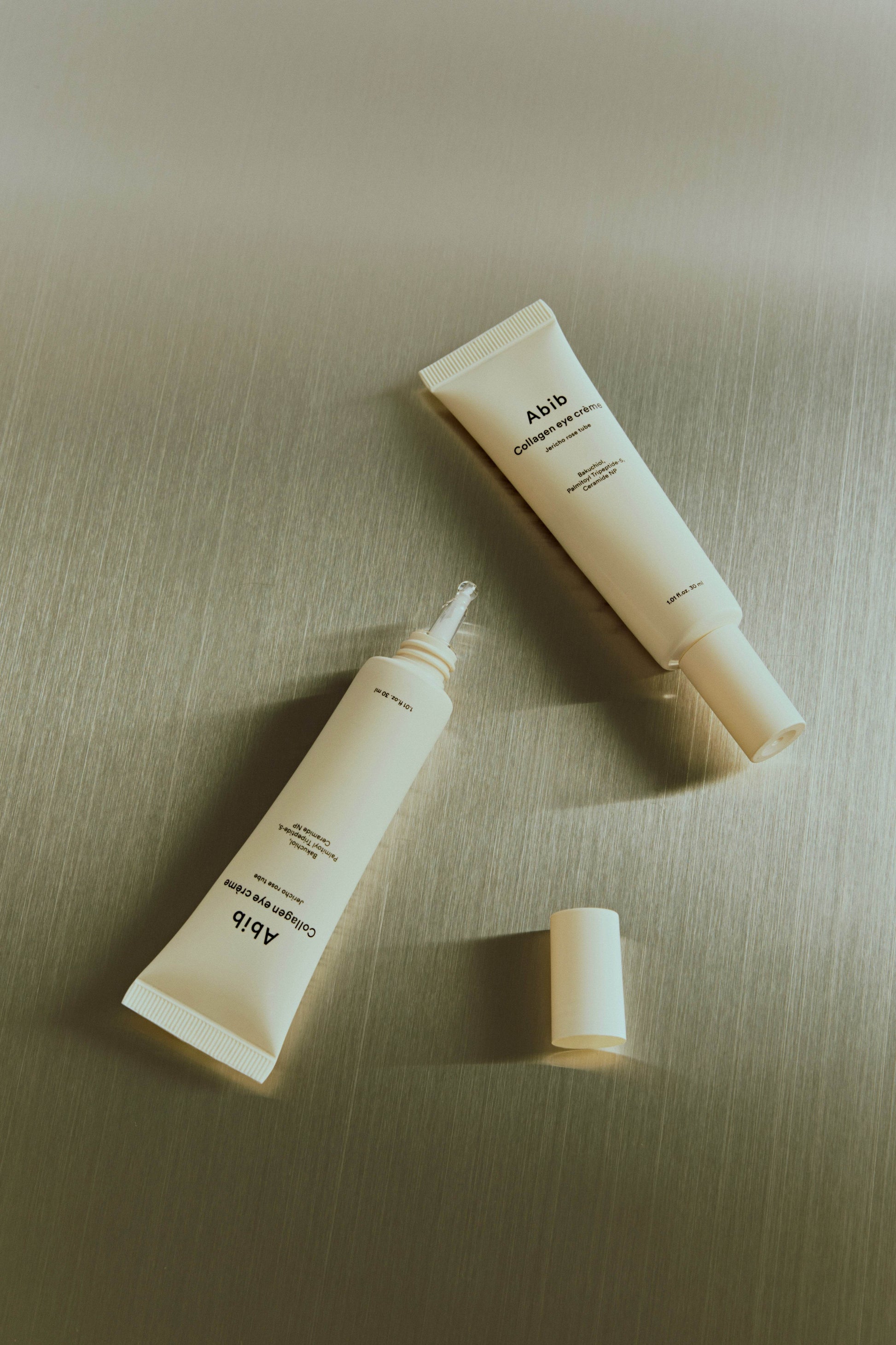 Abib Collagen eye crème Jericho rose tube 30ml, perfect for anti-aging and light eye care, elegantly displayed.